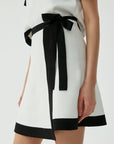 Double-breasted Ecru Mini Tricot Skirt With Ribbon Detail |