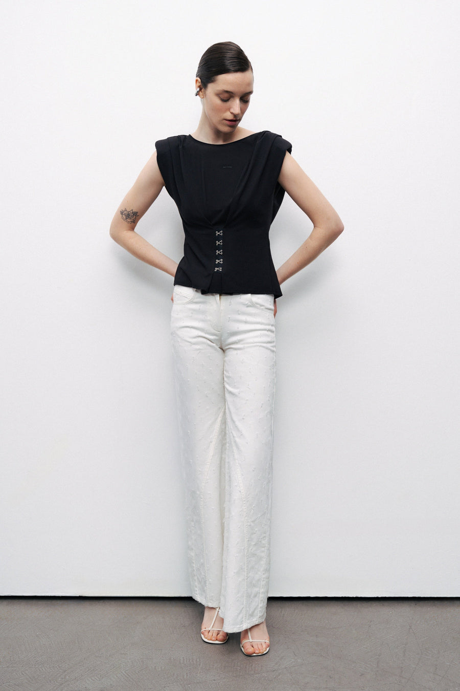 Black T-Shirt with Agraffe Accessory Detail