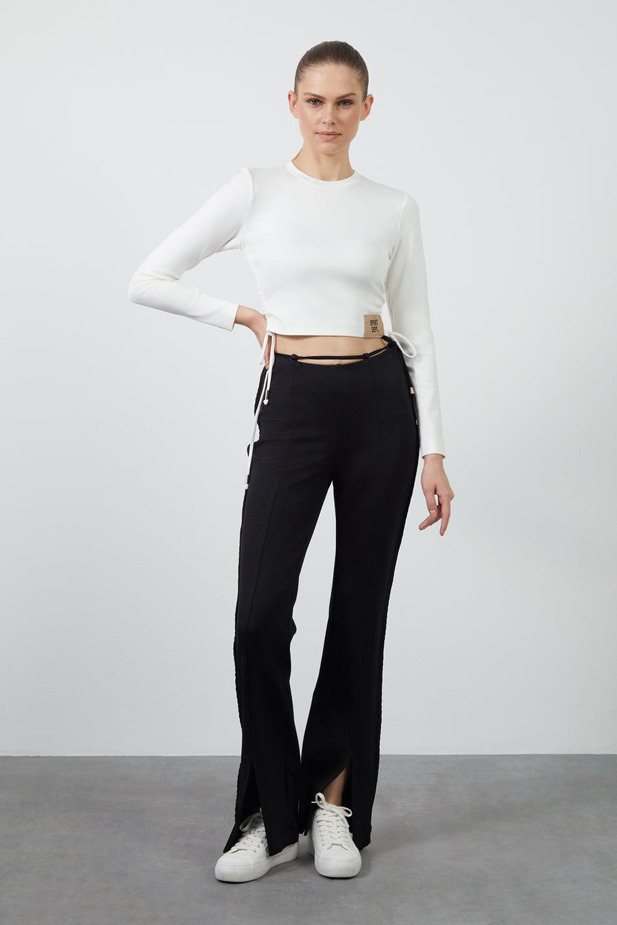 Black Flare Pants With Waist Tie Detail And Front Slits