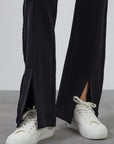 Black Flare Pants With Waist Tie Detail And Front Slits