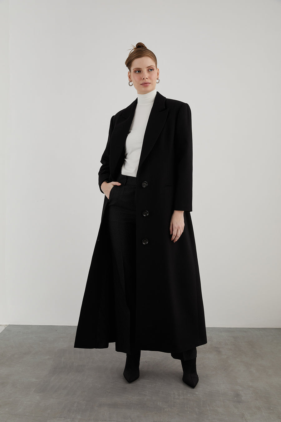 Ankle length black store coat